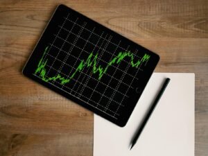 Flatlay of an iPad displaying graph of a growing recreational vehicle website